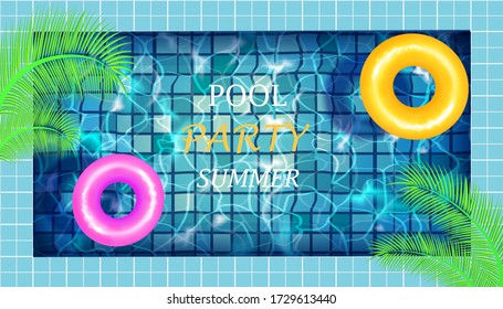 Concept of a summer party in the swimming pool with blue water, ripples,palm leaves and rubber rings. Texture of tiled bottom. Overhead view. 