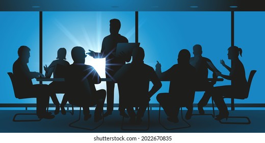 Concept of teamwork with executives of a company who discuss the strategy to take and seek solutions during a brainstorming.