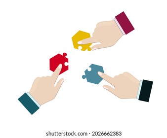 Concept of teamwork and integration with businessman holding colorful puzzle
