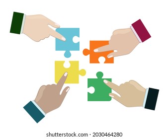 Concept of teamwork and integration with businessman holding colorful puzzle