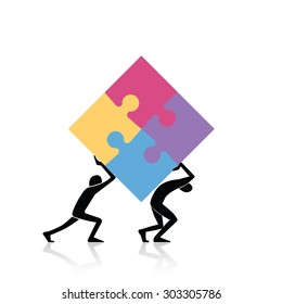 Concept of teamwork - two figures carrying finished puzzle