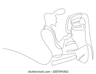 Concept of a teenager sitting in an airplane seat and holding a phone. use of technology in transportation