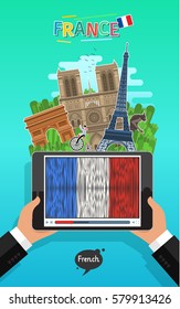 Concept of travel to France or studying French. Male hands holding a tablet with landmarks and hand drawn French flag on the tablet screen. Flat design, vector illustration