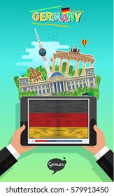 Concept of travel to Germany or studying German. Male hands holding a tablet with landmarks and hand drawn German flag on the tablet screen. Flat design, vector illustration