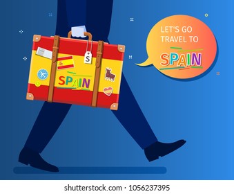 Concept of travel to Spain or studying Spanish. Let's go travel message. A businessman is walking and holding a suitcase with Spanish flag and landmarks. Flat design, vector illustration