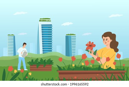 The concept of urban gardening. A woman and a man take care of flowers and plants on the background of skyscrapers.