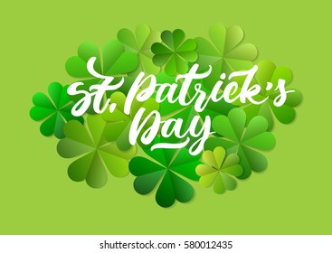 Concept of vector greeting card for St. Patrick's Day. White festive handwritten inscription on the background of green paper leaf clover.