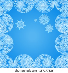 Concept winter frame with snowballs and snowflakes. Place for your text. Light frosty background. It can be used for decorating of invitations, greeting cards, decoration for bags.