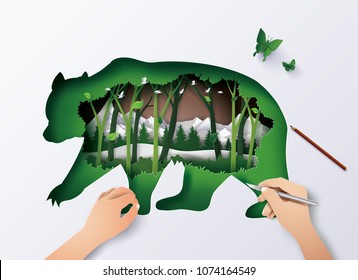 Concept of World Wildlife animal,double exposure with bear and forest, Paper art and digital craft style.