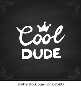 Conceptual handwritten phrase Cool dude. Hand drawn tee graphic. Typographic print poster. T shirt hand lettered calligraphic design. Vector illustration on chalkboard.