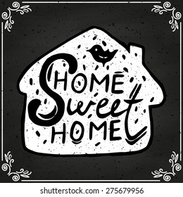 Conceptual handwritten phrase Home Sweet Home. Hand drawn tee graphic. Typographic print poster. T shirt hand lettered calligraphic design. Vector illustration on chalkboard.