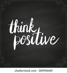 Conceptual handwritten phrase Think positive. Handdrawn lettering design. T shirt hand lettered calligraphic design. Vector illustration on chalkboard.