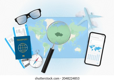 Conceptual illustration of a trip to Czech Republic with travel gear. World map with compass, passport, tickets, cell phone, plane and glass.