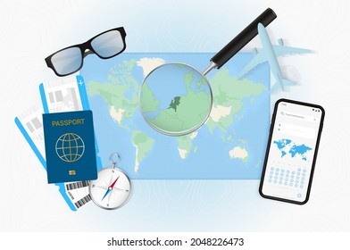 Conceptual illustration of a trip to Netherlands with travel gear. World map with compass, passport, tickets, cell phone, plane and glass.