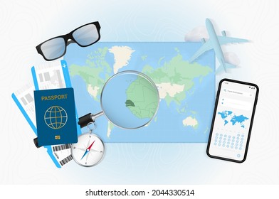 Conceptual illustration of a trip to Senegal with travel gear. World map with compass, passport, tickets, cell phone, plane and glass.