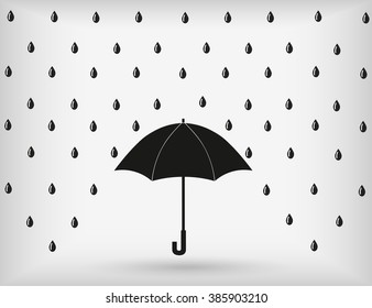 Conceptual image of an open black umbrella suspended midair giving shelter from a strong downpour  rain with.