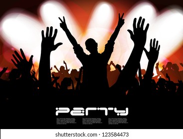 Concert crowd in front of bright stage