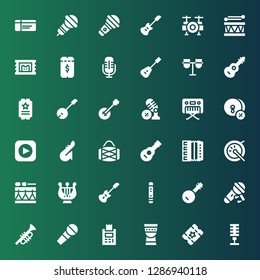 concert icon set. Collection of 36 filled concert icons included Microphone, Ticket, Timpani, Trumpet, Banjo, Flute, Electric guitar, Harp, Drum, Accordion, Guitar, Saxophone