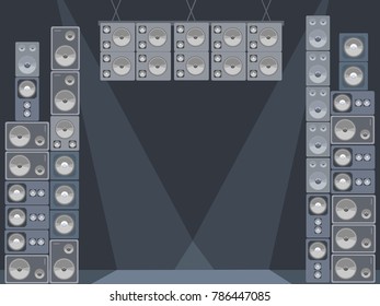 Concert scene ready to rock with huge towers of sound speakers.