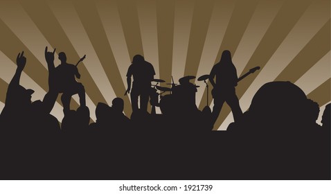Concert silhouette showing the four piece band and crowd rockin out.