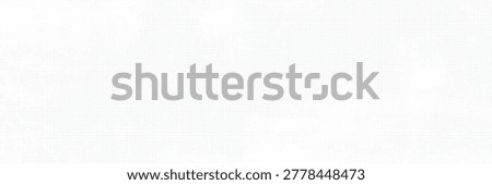 The concrete wall background is textured with large white grunge halftone dots. The backdrop is a rough cement floor with shades of gray and white.