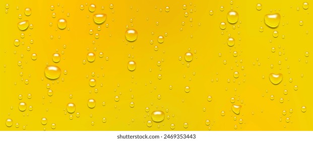 Condensation of water or beer droplets on glass, abstract wet yellow champagne or juice background, backdrop made of rain drops.