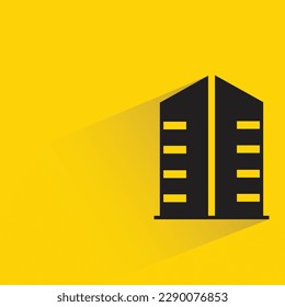 condo tower with shadow on yellow background