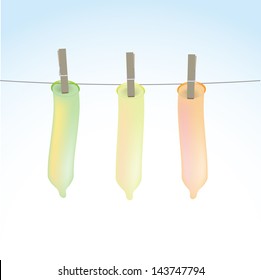 Condoms on clothesline, fix by pegs, illustration