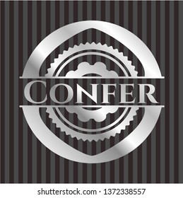 Confer silvery emblem or badge