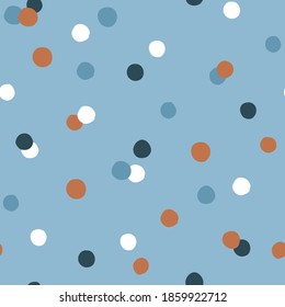 Confetti abstract vector seamless pattern. Hand-drawn geometrical  repeated background for holidays. Christmas or birthday polka dots print in blue and golden colors.