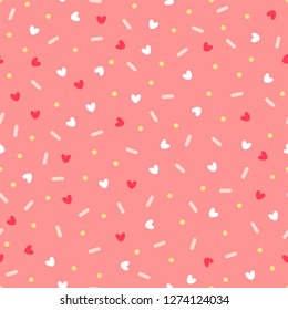Confetti with hearts. Seamless vector pattern on pink background