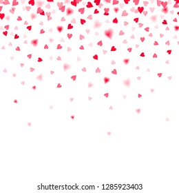 confetti of red falling hearts on a white background