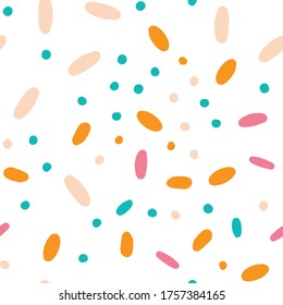 Confetti vector seamless pattern. Abstract festive background with colorful sprinkles and dots.