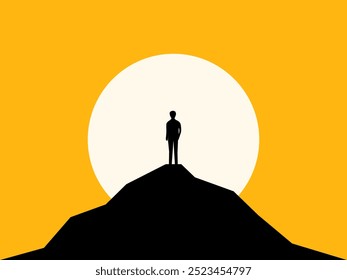 Confident businessman standing on top of a high mountain