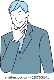 Confident businessman touching his chin