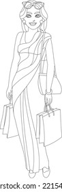 Confident cheerful  Indian Asian woman shopping and carrying shopping bags