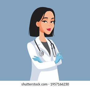 Confident Female Doctor Standing with Arms Crossed. MD cardiologist with stethoscope standing and smiling with confidence
