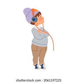 Confident little boy in trendy clothes listening music with headphones. Cute stylish kid in fashionable outfit cartoon vector illustration