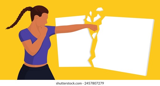 Confident strong woman breaking a blank sign with a fist