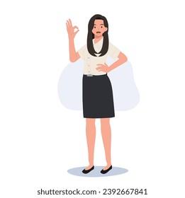 Confident Thai university Student in uniform is Smiling and Showing Ok Sign