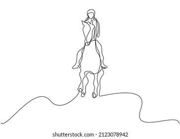 a confident woman is riding horse outside