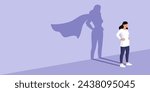 Confident woman standing and looking away, she is casting the shadow of a superhero, confidence and strength concept