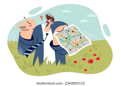 Confused business man stands on meadow with map of area and spreads arms, not knowing where to go. Confused guy in formal suit was victim of fraud came to field in search of company office.