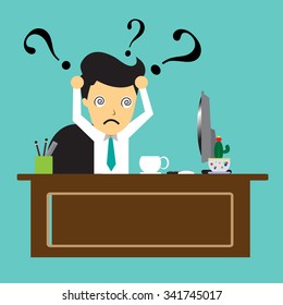 Confused businessman in front of computer