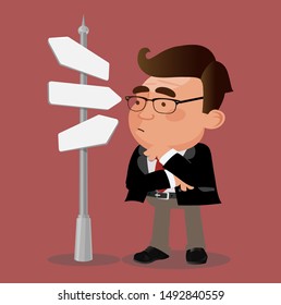 Confused businessman thinking and making choice at road sign