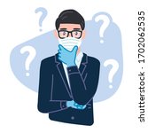 Confused businessman wearing protective Medical mask and gloves for prevent corona virus Covid-19, is thinking with crossed arm. Question mark. Musing employee in suit. Worried office worker