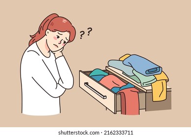 Confused girl look at open drawer with clothes have nothing to wear. Unhappy young woman looking at apparel, have clothing problem. Shopaholic and garment issues. Vector illustration. 