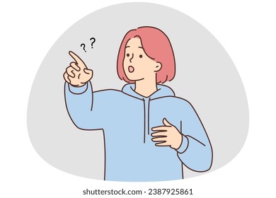 Confused girl point at something feeling shocked and stunned. Frustrated teenager show direction. Vector illustration.