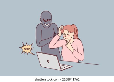 Confused Woman Looking At Computer Screen Reading Fake News Online. Frustrated Female Use Laptop Worried About Notification On Web. Propaganda And Media Manipulation. 