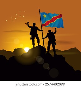 Congo flag, silhouette of two climbers holding flags at sunset